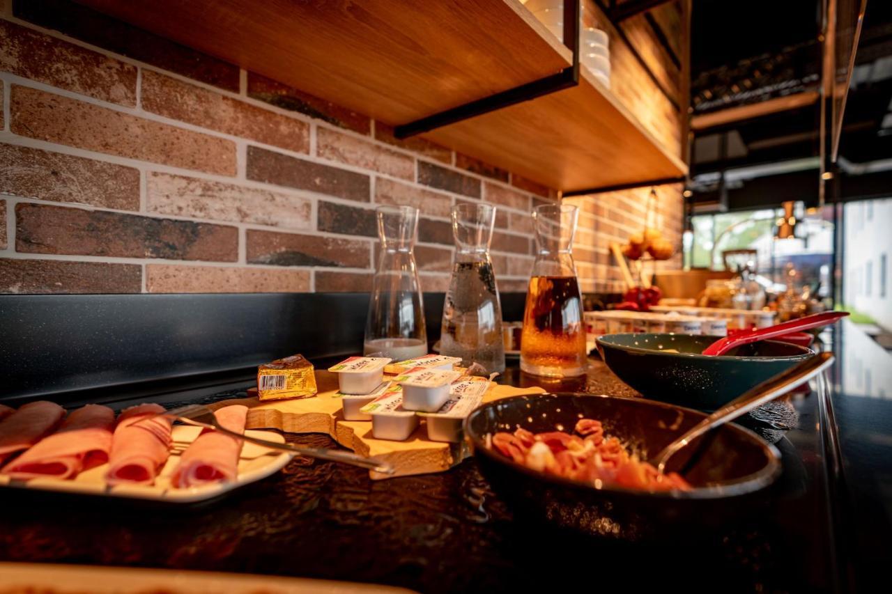Ibis Budget Valenciennes เปอติตฟอเรต์ ภายนอก รูปภาพ